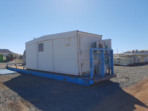 Portable crib room on skid with shower
