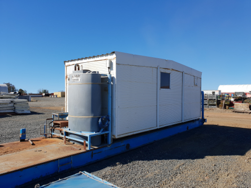 Portable crib room on skid with shower