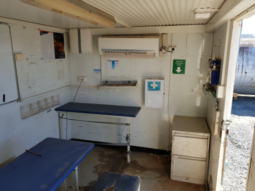 Portable crib room on skid with shower