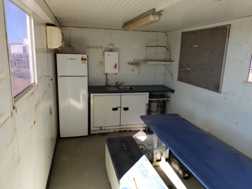 Portable crib room on skid with shower